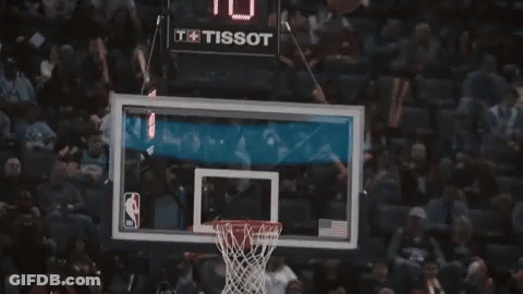 A Basketball Player Wearing A Black Jersey With The Word Chicago On It Is Standing On A Court . GIF