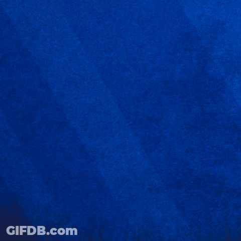 A Basketball Player Wearing A Blue Byu Jersey Number 3 GIF
