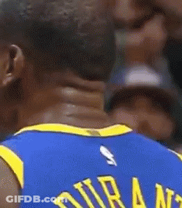A Basketball Player Wearing A Blue Jersey With The Name Durant On It GIF