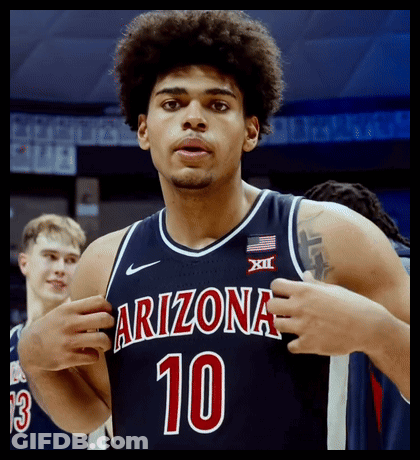 A Basketball Player Wearing A Blue Jersey With The Number 10 On It GIF