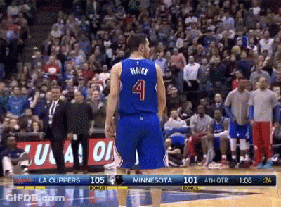 A Basketball Player Wearing A Blue Jersey With The Number 4 On It GIF
