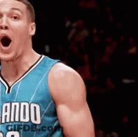A Basketball Player Wearing A Blue Orlando Jersey GIF