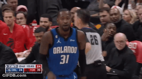 A Basketball Player Wearing A Blue Orlando Jersey GIF