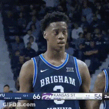A Basketball Player Wearing A Brigham Jersey Is Standing On The Court . GIF