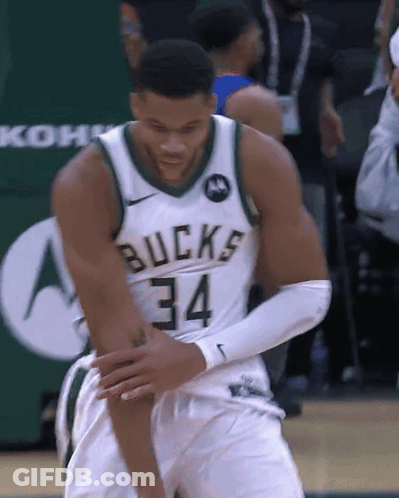 A Basketball Player Wearing A Bucks Jersey Number 34 GIF