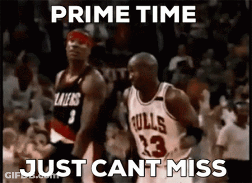 A Basketball Player Wearing A Bulls Jersey Is Being Chased By Another Player GIF