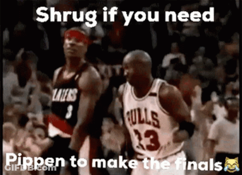 A Basketball Player Wearing A Bulls Jersey Is Standing Next To Another Basketball Player . GIF