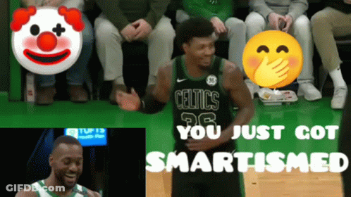 A Basketball Player Wearing A Celtics Jersey Is Being Congratulated By A Clown GIF