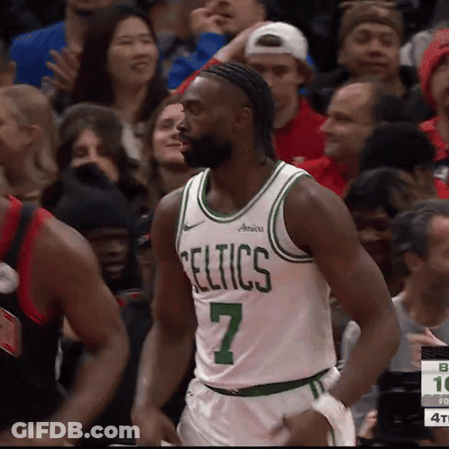 A Basketball Player Wearing A Celtics Jersey With The Number 7 On It GIF