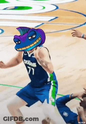 A Basketball Player Wearing A Dallas Jersey With A Cartoon Character On His Head GIF