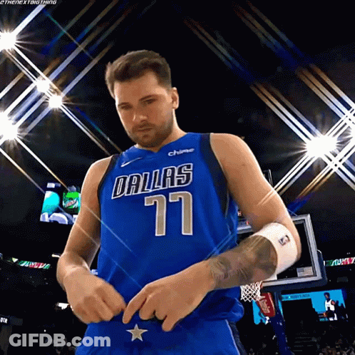 A Basketball Player Wearing A Dallas Jersey With The Number 77 On It GIF