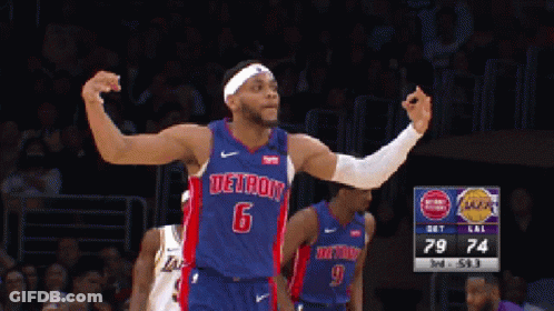 A Basketball Player Wearing A Detroit Jersey Stands On The Court GIF