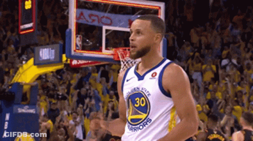 A Basketball Player Wearing A Golden State Warriors Jersey Celebrates GIF