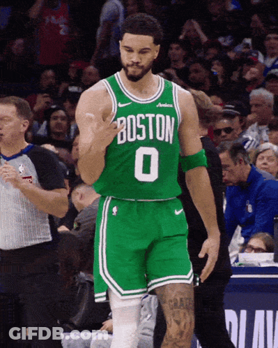 A Basketball Player Wearing A Green Jersey With Boston 0 On It GIF