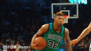 A Basketball Player Wearing A Green Jersey With Boston 36 On It GIF