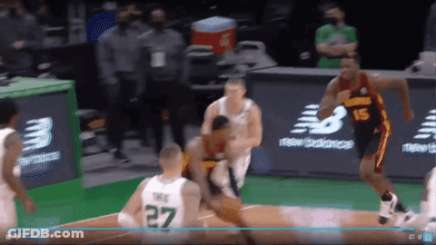 A Basketball Player Wearing A Green Jersey With The Number 27 GIF