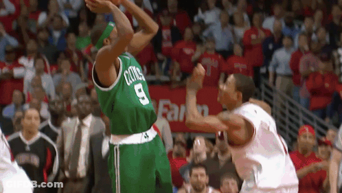 A Basketball Player Wearing A Green Jersey With The Number 8 On It GIF