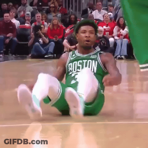 A Basketball Player Wearing A Green Jersey With The Word Boston On It GIF
