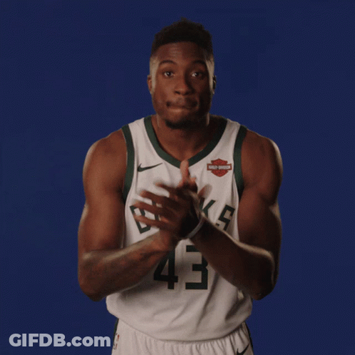 A Basketball Player Wearing A Harley Davidson Jersey GIF