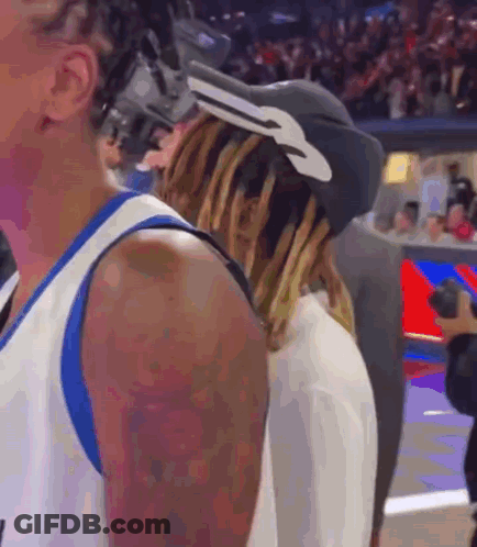 A Basketball Player Wearing A Hat With A Key On It GIF