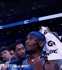 A Basketball Player Wearing A Headband And A Gatorade Shirt GIF