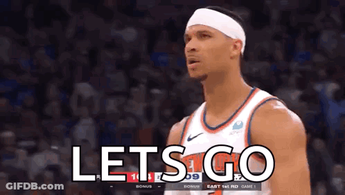 A Basketball Player Wearing A Headband Is Standing In Front Of A Crowd And Says `` Let 'S Go '' . GIF