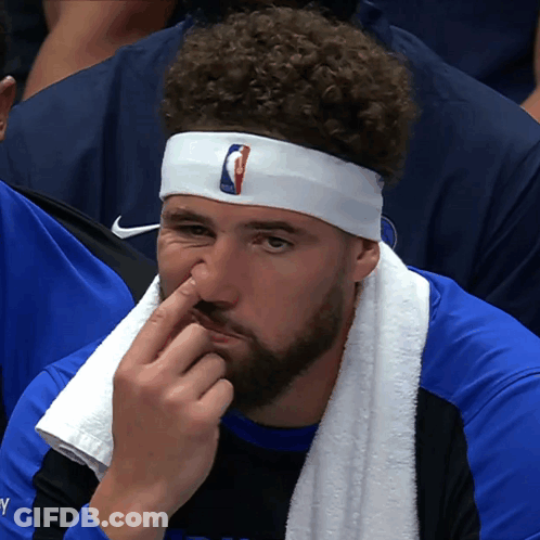 A Basketball Player Wearing A Headband With The Nba Logo GIF