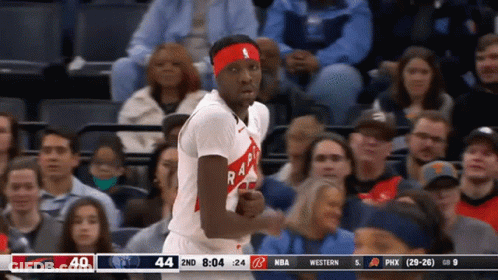 A Basketball Player Wearing A Headband With The Word Raptors On It Stands In Front Of A Crowd GIF
