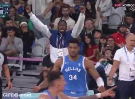 A Basketball Player Wearing A Hellas Jersey Stands On The Court GIF