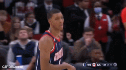 A Basketball Player Wearing A Houston Jersey Stands On The Court GIF