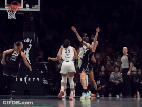 A Basketball Player Wearing A Jersey That Says 35 GIF