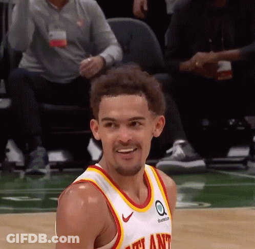 A Basketball Player Wearing A Jersey That Says Atlanta Is Smiling GIF