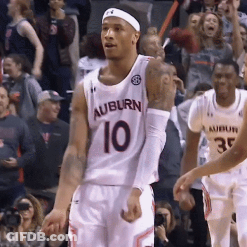 A Basketball Player Wearing A Jersey That Says Auburn 10 GIF