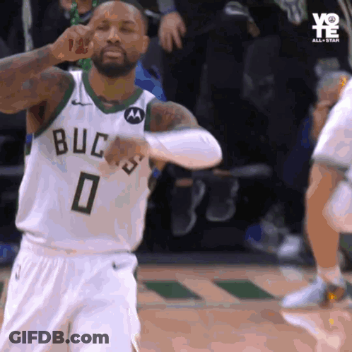 A Basketball Player Wearing A Jersey That Says Bucks 0 GIF