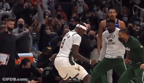 A Basketball Player Wearing A Jersey That Says " Bucks " On It GIF