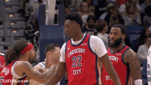 A Basketball Player Wearing A Jersey That Says Crescent City GIF