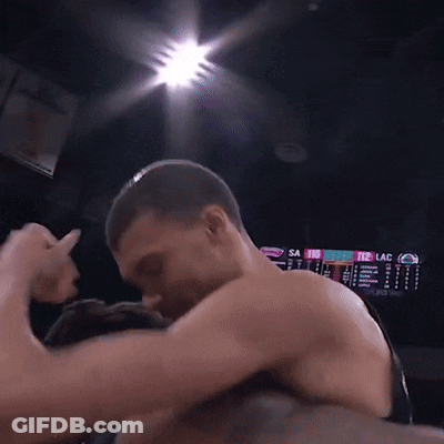 A Basketball Player Wearing A Jersey That Says ' Hasse ' On It Is Hugging Another Player GIF