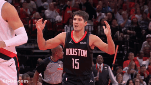 A Basketball Player Wearing A Jersey That Says Houston 15 On It GIF