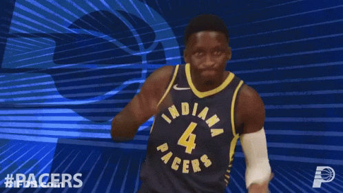 A Basketball Player Wearing A Jersey That Says Indiana On It GIF