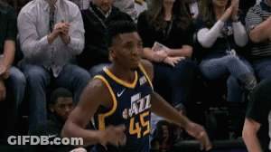 A Basketball Player Wearing A Jersey That Says Jazz 45 GIF