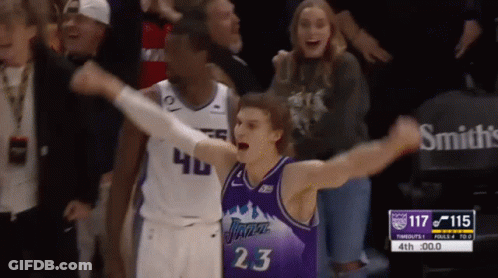 A Basketball Player Wearing A Jersey That Says Jazz On It GIF