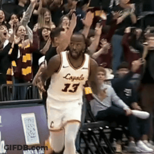 A Basketball Player Wearing A Jersey That Says Loyals 13 GIF