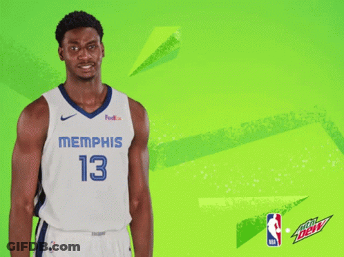 A Basketball Player Wearing A Jersey That Says Memphis 13 On It GIF