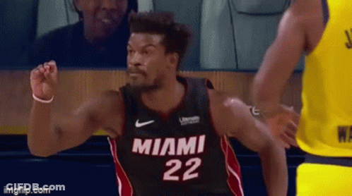 A Basketball Player Wearing A Jersey That Says Miami 22 On It GIF