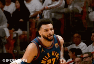 A Basketball Player Wearing A Jersey That Says Mile High On It GIF