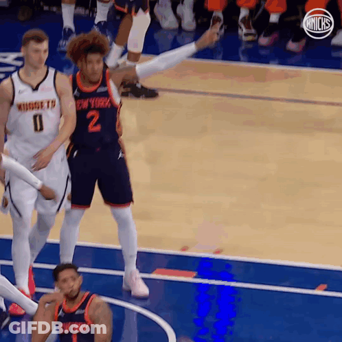A Basketball Player Wearing A Jersey That Says New York GIF