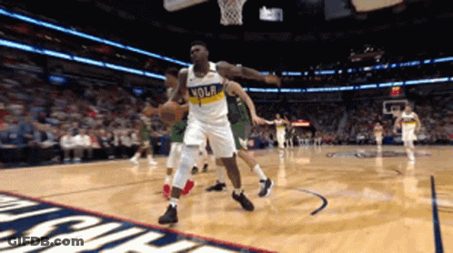 A Basketball Player Wearing A Jersey That Says Nola GIF