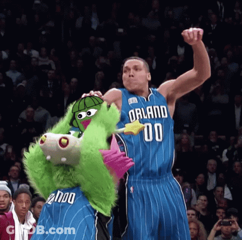 A Basketball Player Wearing A Jersey That Says Orland 00 On It GIF