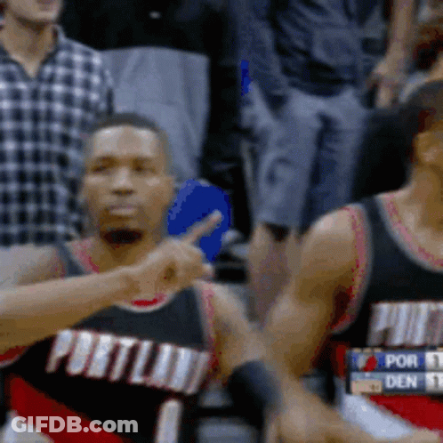 A Basketball Player Wearing A Jersey That Says Portland GIF