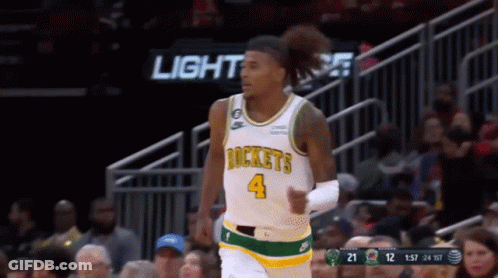 A Basketball Player Wearing A Jersey That Says Rockets GIF